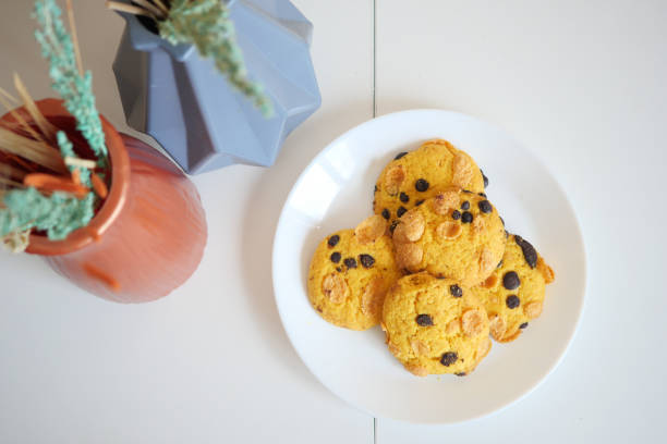 istock top view of sweet cookies on a plate on white table 1589757748