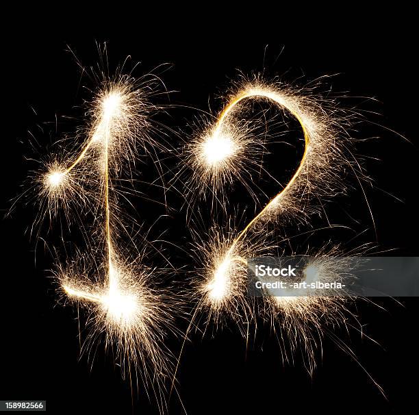 Glowing 12 Stock Photo - Download Image Now - Black Background, Black Color, Bright