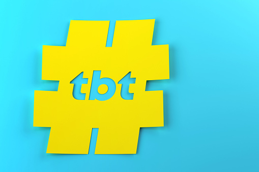TBT Written Yellow Hashtag Note Paper On Blue Background
