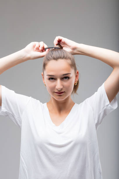 istock First I'll get my hair in a tail, then we'll see. 1589834054