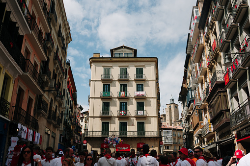 Pamplona, Spain - 7 July 2023: Mercaderes street in Pamplona, Spain. This street is part of the San Fermin running of the bulls route.