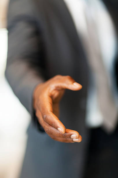 istock african american businessman handshake 158987403