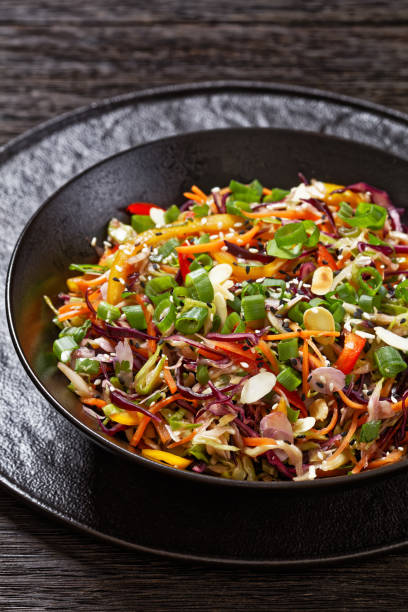 istock asian slaw, crunchy oriental cabbage salad in bowl 1589901916