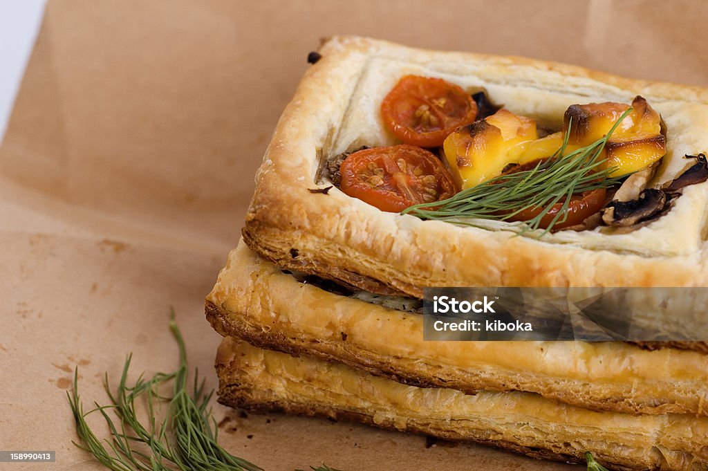 vegetarian pies stack of vegetarian small puff pies Baked Stock Photo