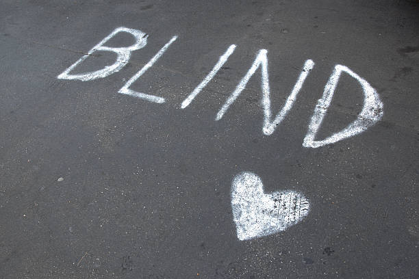 istock Blind and heart written on the asphalt 158990617