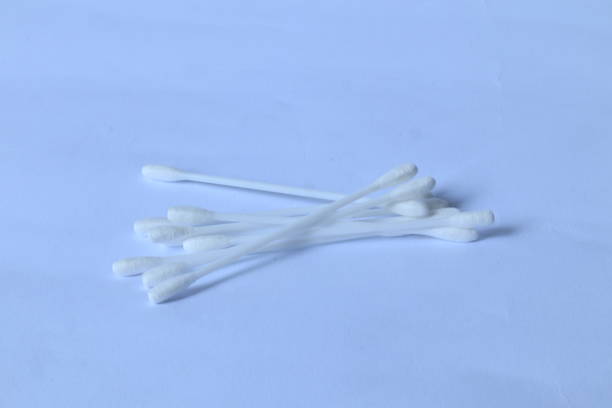 istock White cotton swabs isolated on white background 1589921952
