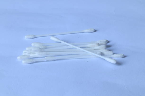 istock White cotton swabs isolated on white background 1589921960