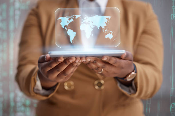 istock Person hands, tablet and map hologram for worldwide connection, global data and cybersecurity software development. 3D holographic, digital world or planet of business woman in futuristic app overlay 1589923087