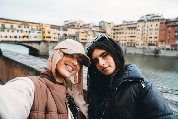 istock Two friends are taking a selfie in Florence, Italy 1589926392