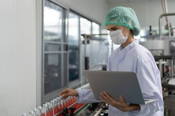 istock quality inspector food or beverages technician inspection about quality control food or beverages before send product to the customer. Production leader recheck ingredient and productivity. 1589930163