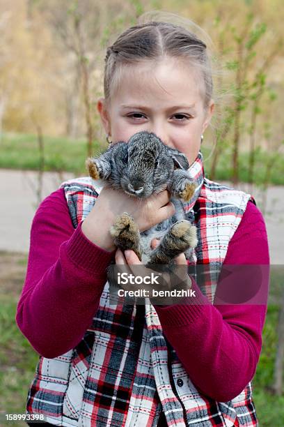 Girl And Rabbit Stock Photo - Download Image Now - Animal, Baby - Human Age, Baby Girls