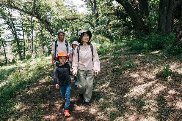 istock Japanese family going for a hike together 1589946367