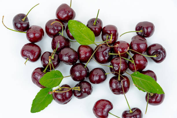 istock red sweet cherry isolated on white background 1589956400