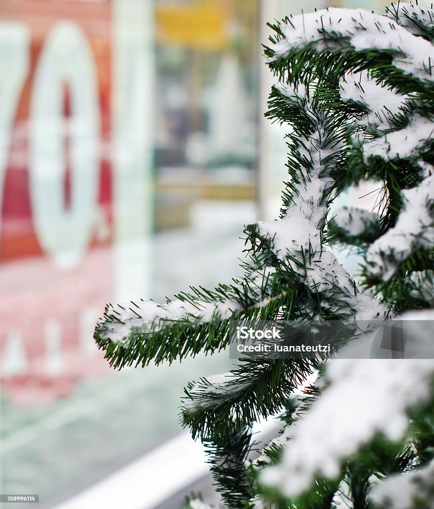 Winter Christmas Sale Department store window with sale sign. Christmas sale discount sign in shop window. Abstract Stock Photo