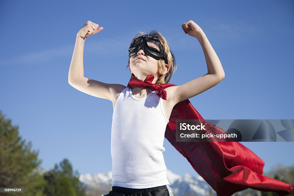 Super Hero Boy Young boy pretends to be a super hero. Superhero Stock Photo