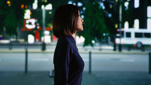 istock Asian person walking around town 1589969897
