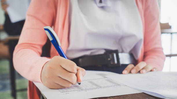 istock The students were doing the exams inside the classroom with stress.Assessment examination of high school students 1589971033