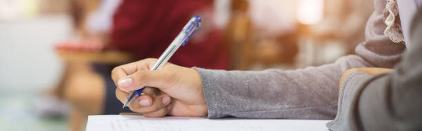 istock The students were doing the exams inside the classroom with stress.Assessment examination of high school students 1589972665
