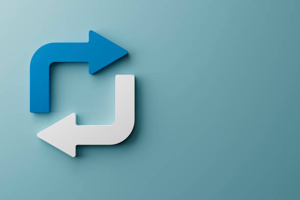 Arrows in circle representing currency exchange rate concept image.