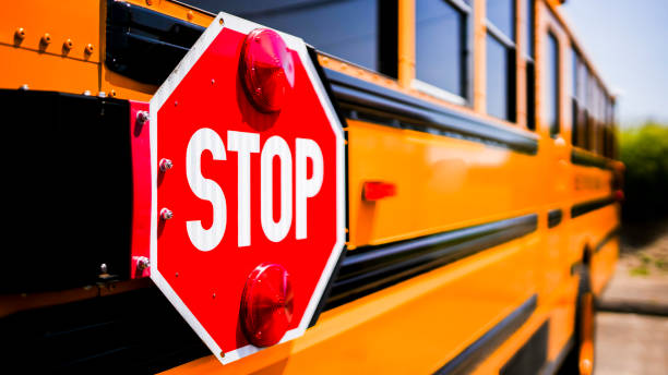 Stop sign on school  bus with selective focusing