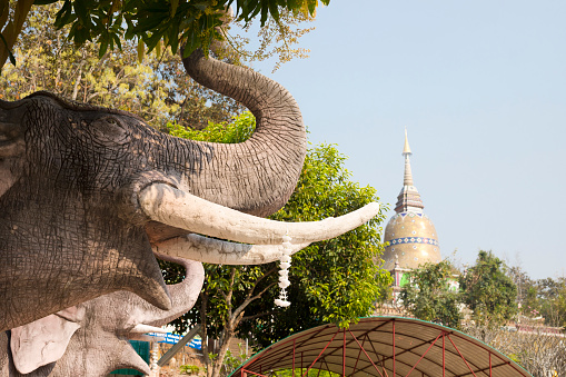 View of the Statue of 4 elephant on a sunny day. Close-up. Chambery. France.