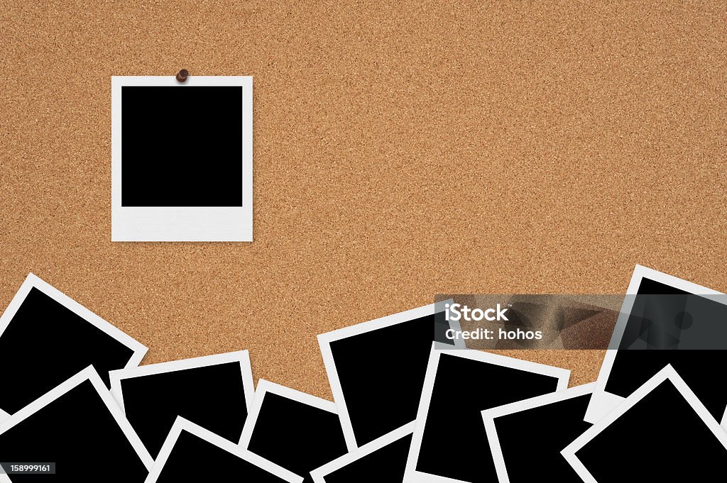 Polaroid Frames on Bulletin Board Polaroid Frames on CorkBoard. Black Color Stock Photo