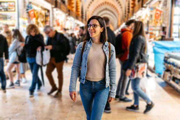 istock Young Woman Walking Through Grand Bazaar In Istanbul 1590035299