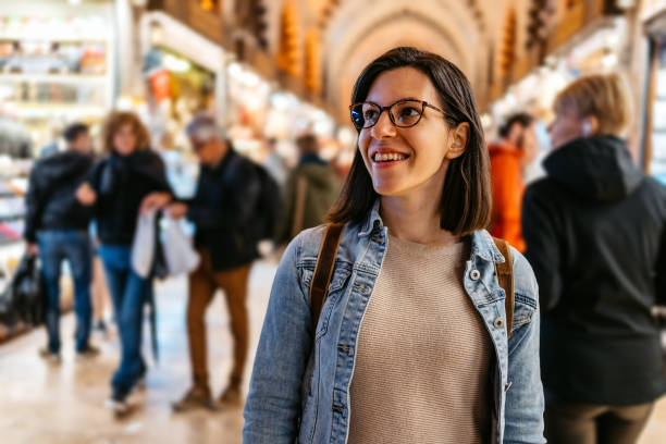 istock Young Woman Walking Through Grand Bazaar In Istanbul 1590037585