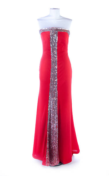 Red Dress Red dress isolated with lights on a white background. No clipping path. red evening gown mannequin indoors stock pictures, royalty-free photos & images