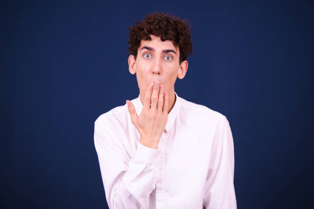 istock Funny emotional guy is preparing for exams. 1590055343