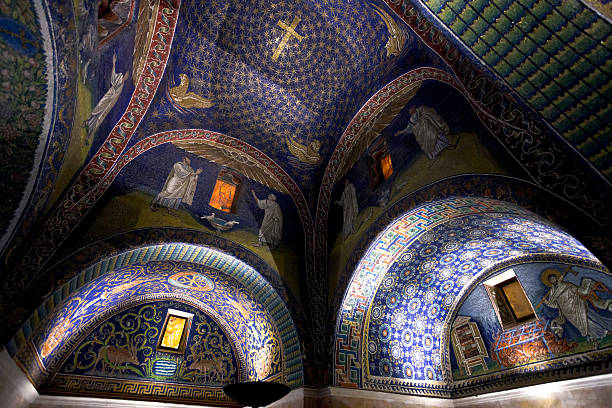 dark blue Mosaic of the galla placidia mausoleum in Ravenn dark blue Ceiling Mosaic of the galla placidia mausoleum. Built between 425 and 433, this small mausoleum adopts a cruciform plan, in Ravenna, Italy on November 4, 2012 mausoleum photos stock pictures, royalty-free photos & images