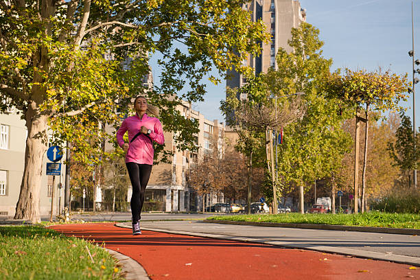 istock young girl jogging 159006158