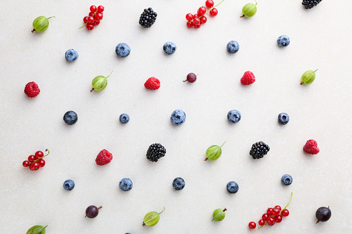 Fresh summer berries background. Healthy food above pattern