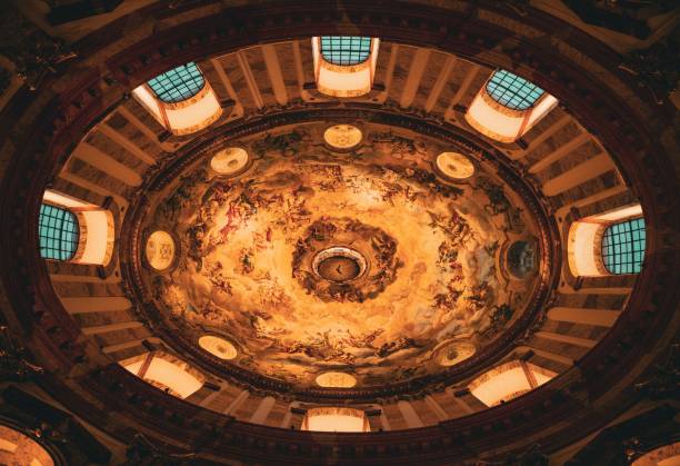 istock Close-up view of a ceiling in an interior space with multiple windows and intricate stone work 1590090355