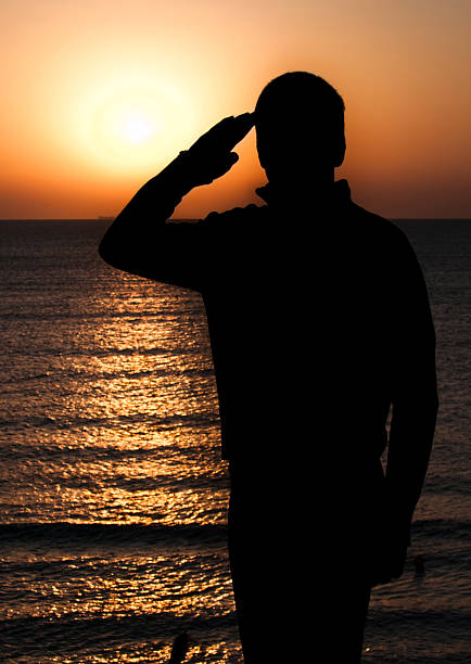 istock Man silhouette at sunrise 159009615