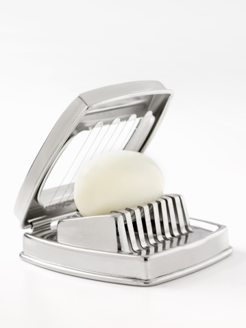 Hard Boiled Egg in Slicer  -Photographed on Hasselblad H1-22mb Camera