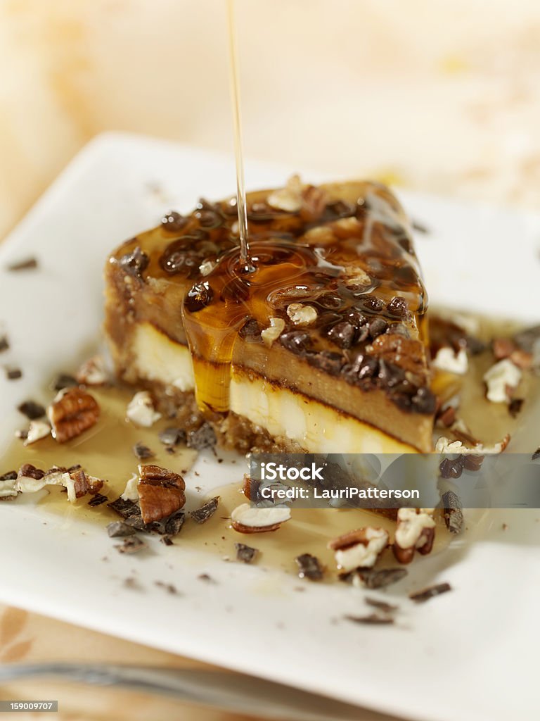 Walnut and Caramel Cheesecake Walnut and Caramel Cheesecake with Caramel Sauce  -Photographed on Hasselblad H3D2-39mb Camera Chocolate Stock Photo