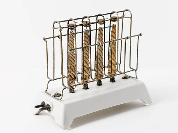 antique electric toaster antique electric toaster -Photographed on Hasselblad H1-22mb Camera kitchen utensil antique toaster old stock pictures, royalty-free photos & images