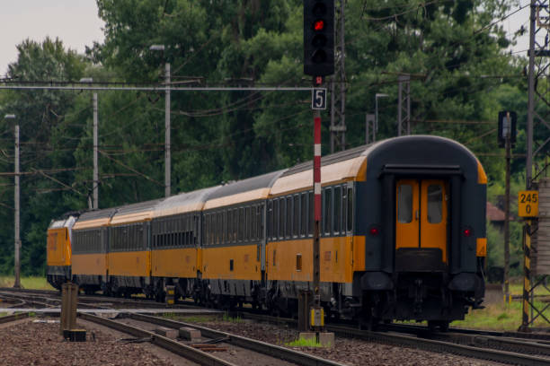 Train in color summer cloudy hot day in Studenka CZ 07 21 2023
