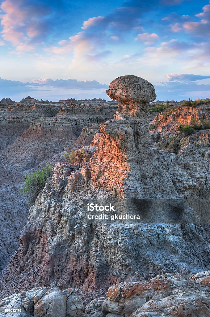 The Hoodoo The Hoodoo - lit up by sunrise in Badlands National Park of South Dakota, USA South Dakota Stock Photo