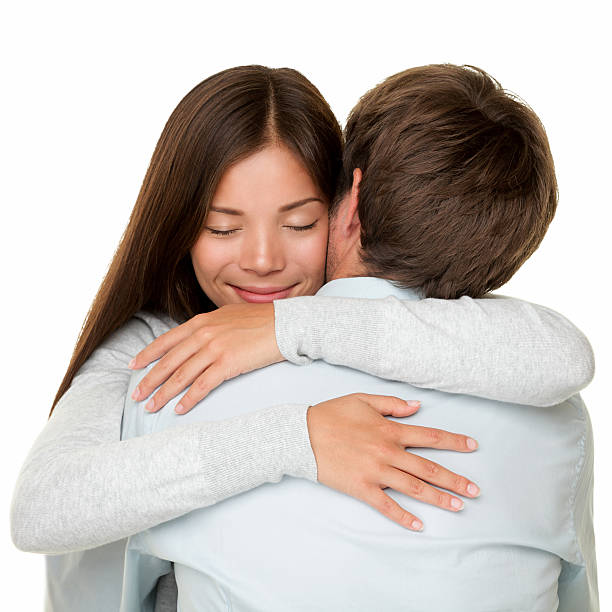 istock Embracing couple hugging happy 159014370