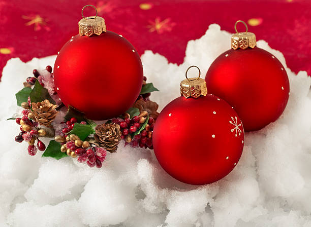 Three red Christmas balls stock photo