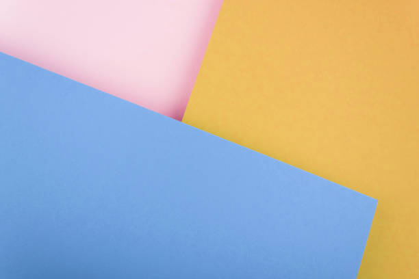 istock Abstract pastel colored paper texture. Geometric shapes and lines. Minimalist background. Flat lay. Copy space. 1590191676