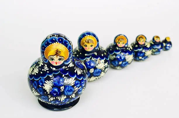 A view of blue colored Russian babushka nesting dolls.