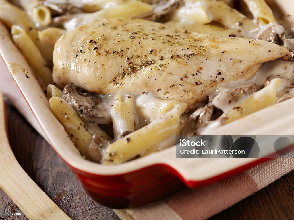 Creamy Baked Chicken, Mushroom and Penne Casserole Creamy Baked Chicken, Mushroom and Penne Casserole -Photographed on Hasselblad H3D-39mb Camera American Culture Stock Photo