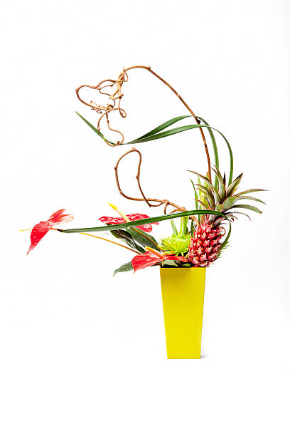 Artificial flower in wooden basket.