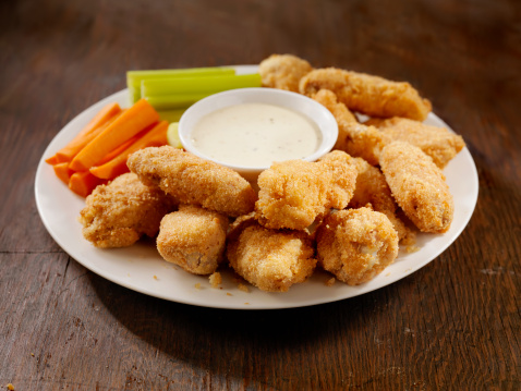 A Dozen Crispy Chicken Wings with Celery, Carrots and Blue Cheese Dip-Photographed on Hasselblad H3D-39mb Camera