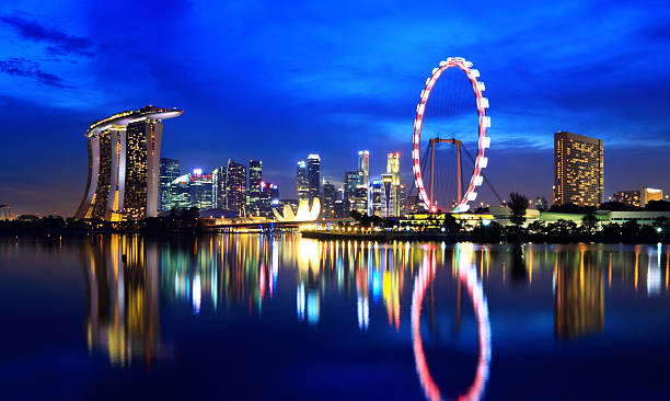 istock Singapore cityscape at night 159022803