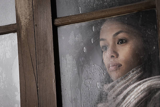 istock Beautiful girl behind window 159022841