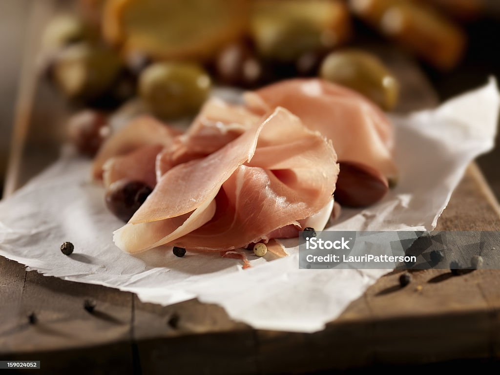 Tranches de jambon Prosciutto - Photo de Planche à découper libre de droits